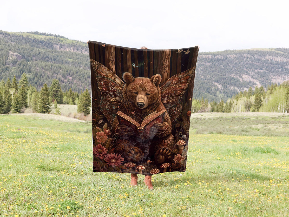 a bear with wings is standing in a field