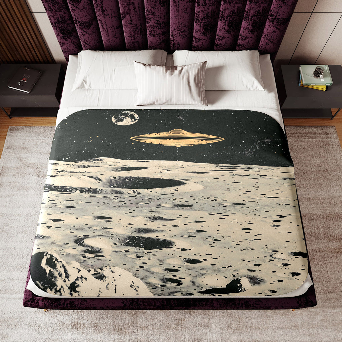 a bed with a picture of the moon on it
