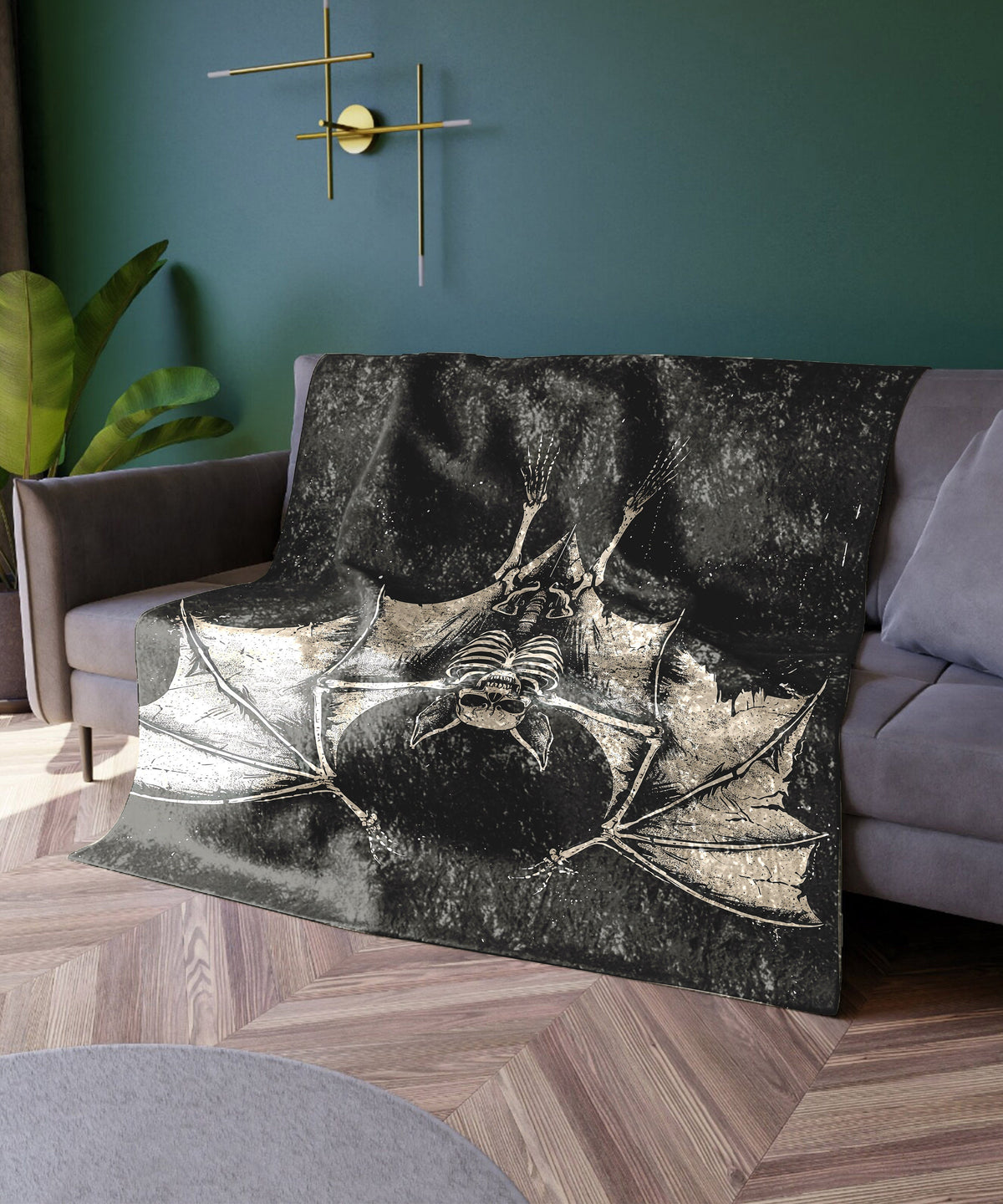 a black and white photo of a bat on a couch