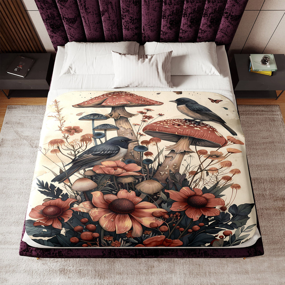 a bed with a painting of birds and flowers on it