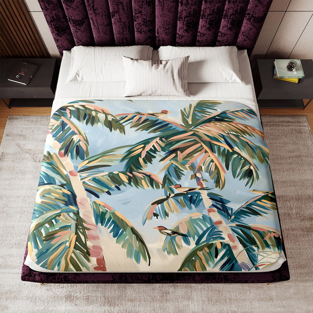a bed with a tropical print on it