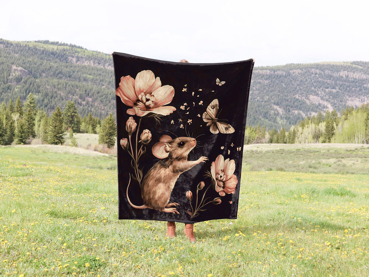 a blanket with a picture of a mouse on it