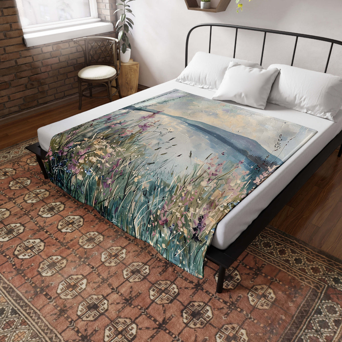 a bed with a painting on it in a room