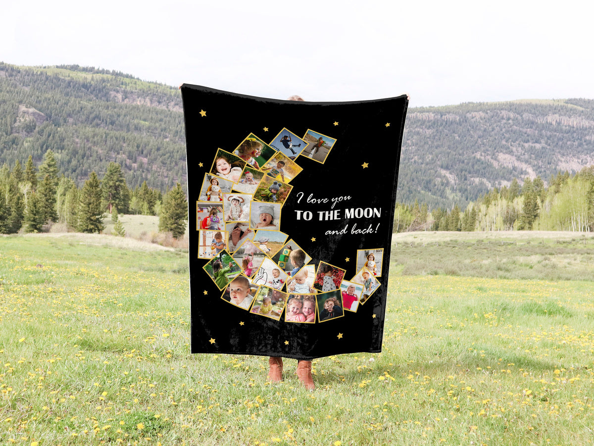 a woman holding up a blanket with photos of people on it