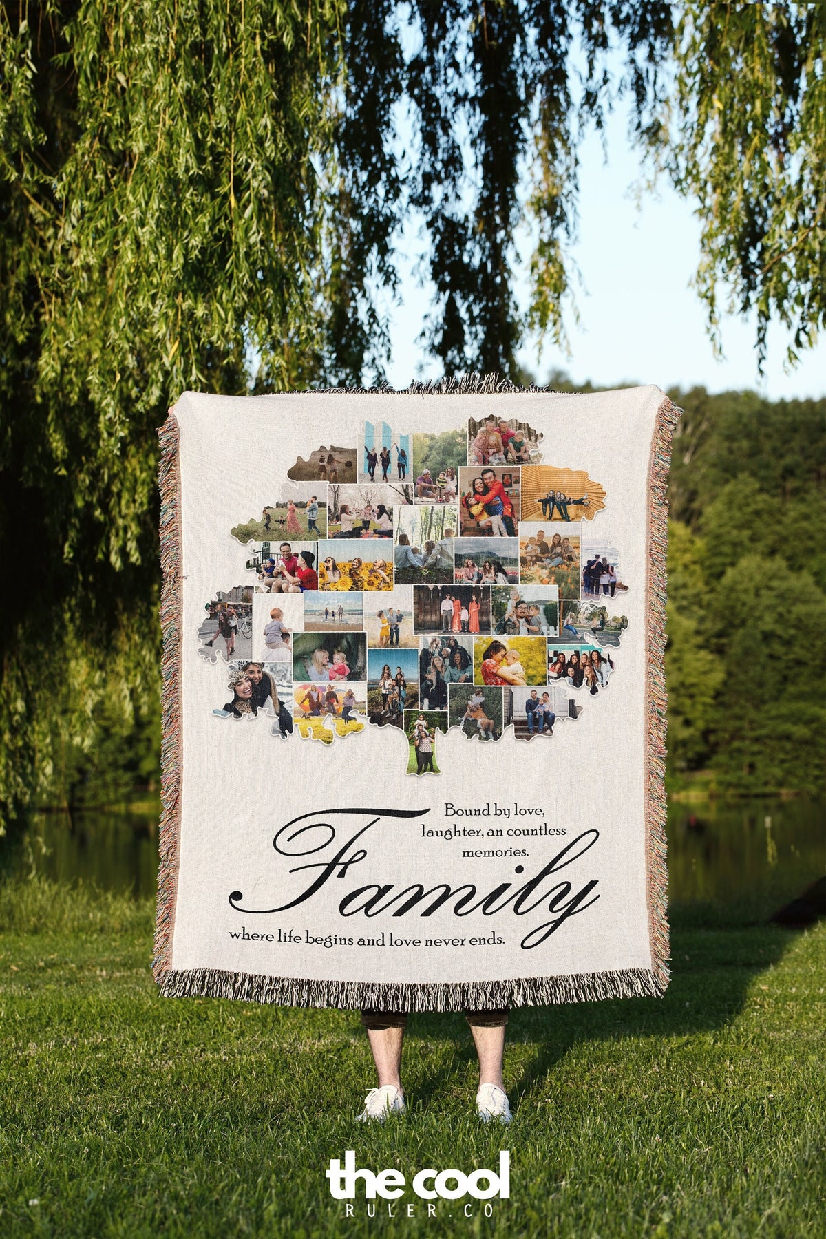 a woman holding a blanket with a family picture on it