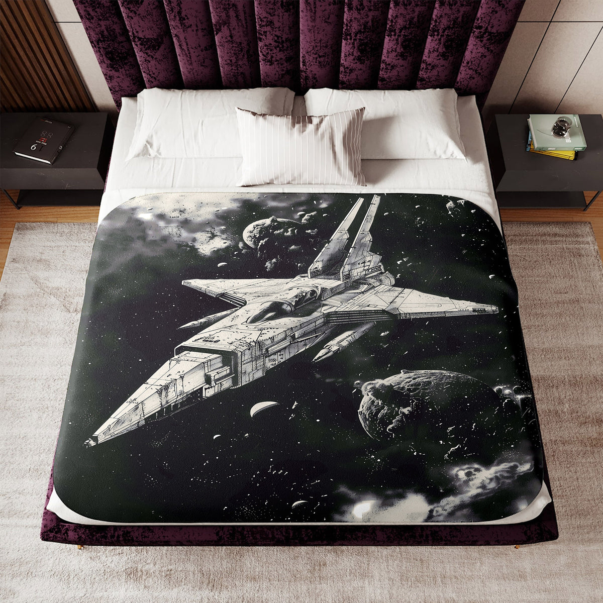 a bed that has a picture of a space ship on it