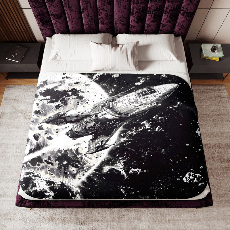 a bed with a black and white picture of a space shuttle on it