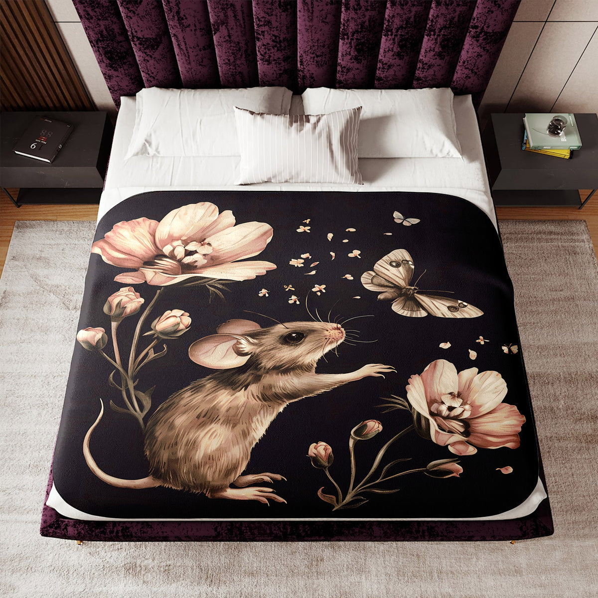 a bed with a mouse and flowers on it