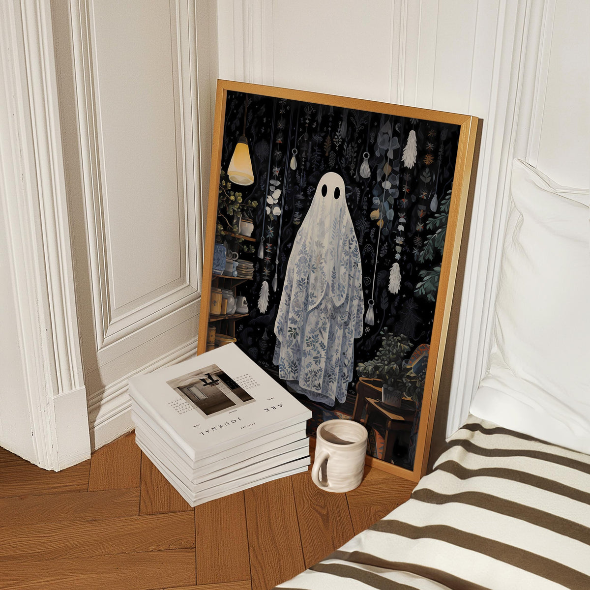 a picture of a ghost on a wall next to a stack of books