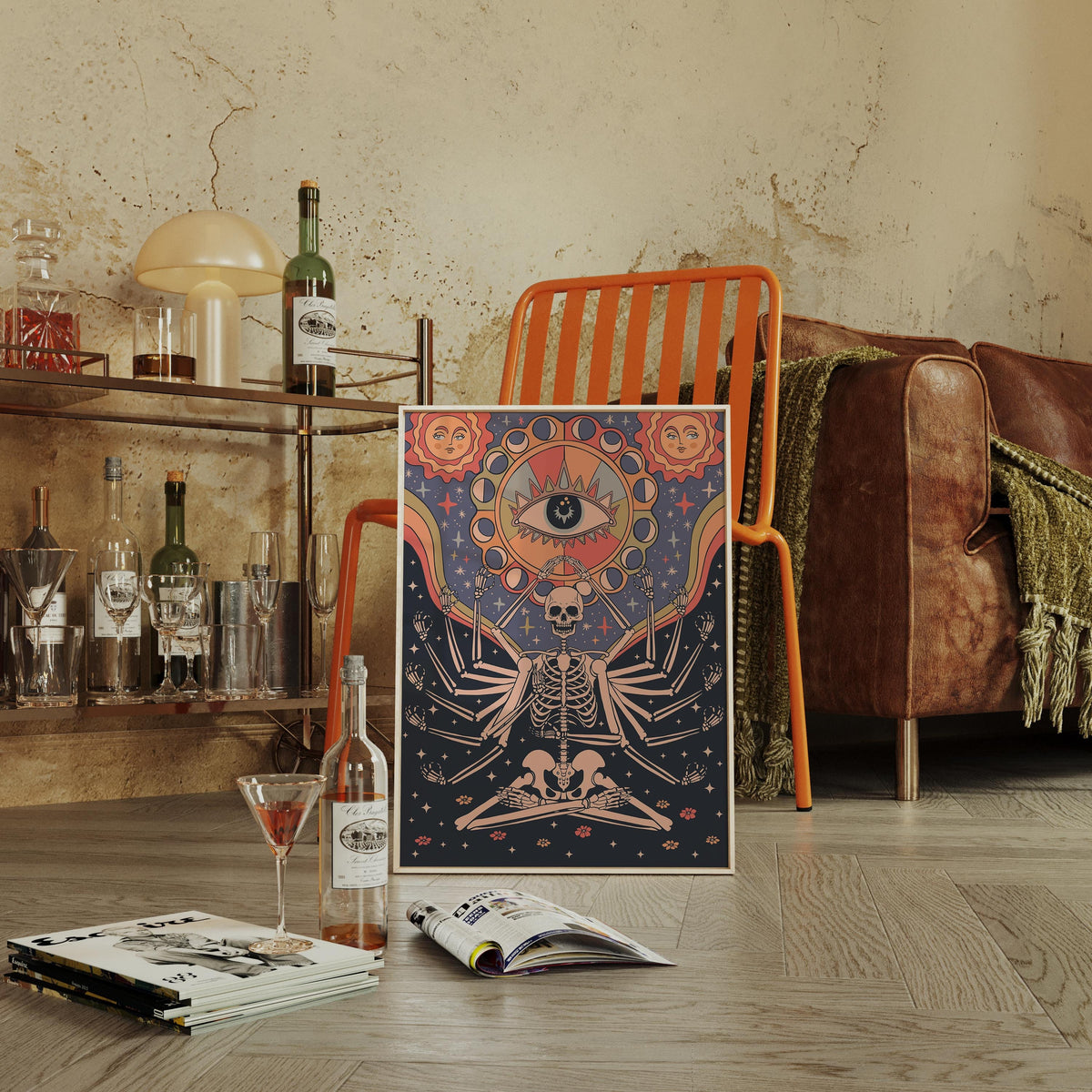 a table with a bottle of wine and a book on it