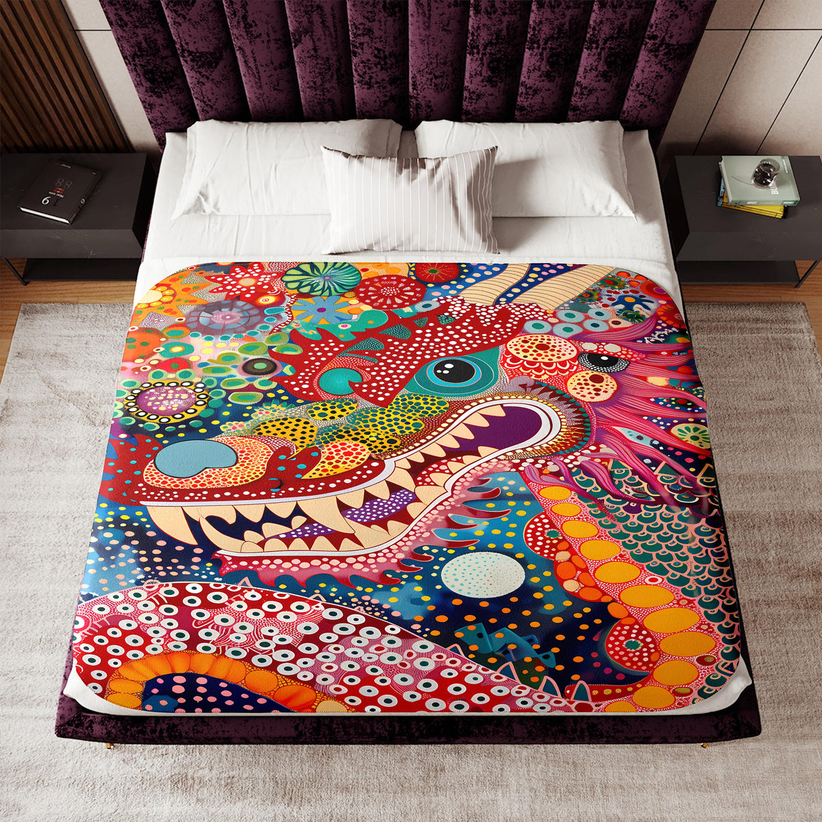 a bed with a dragon comforter on top of it