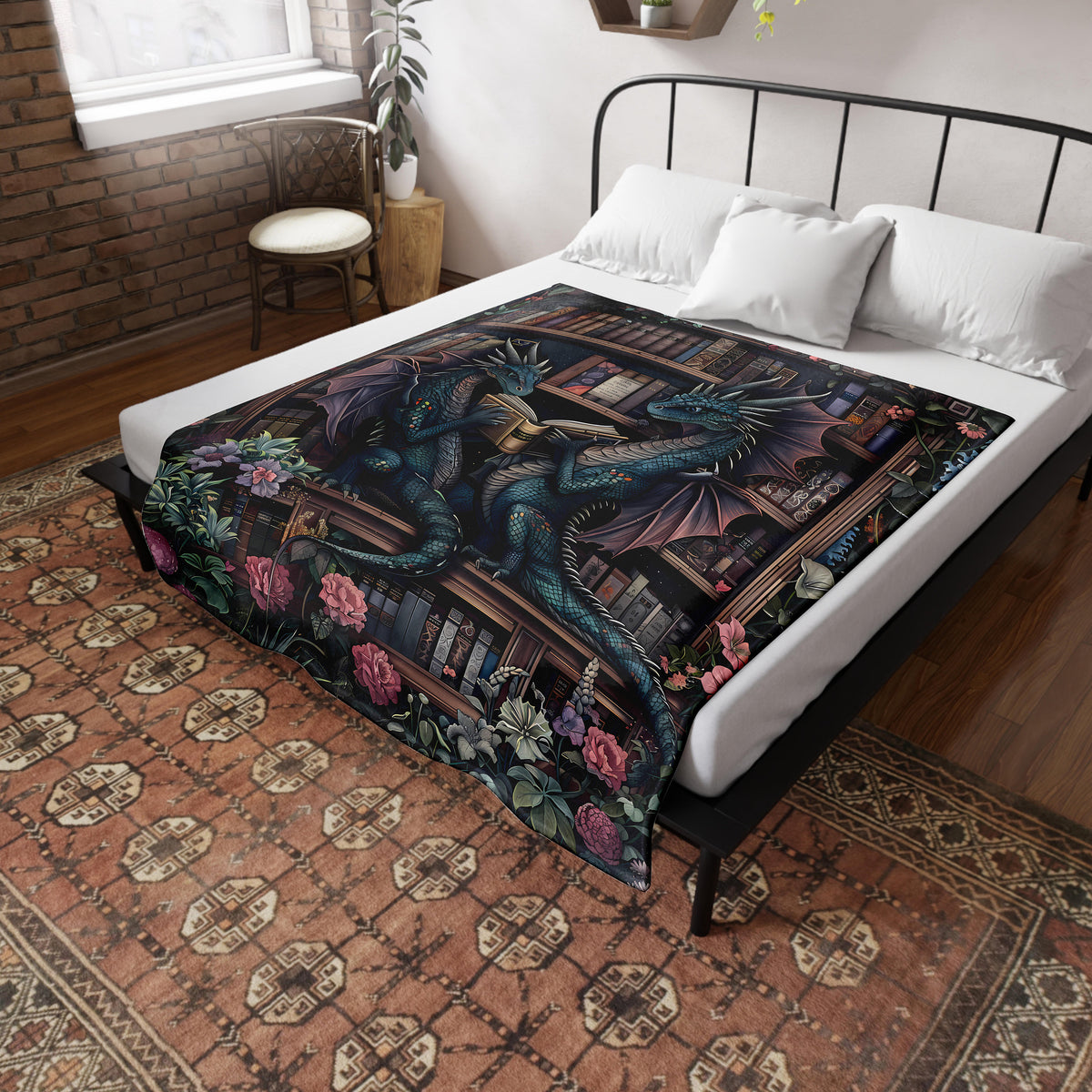a bed with a dragon comforter on top of it
