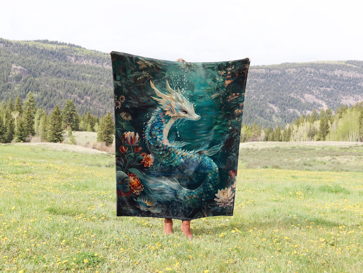 a blanket with a picture of a dragon on it