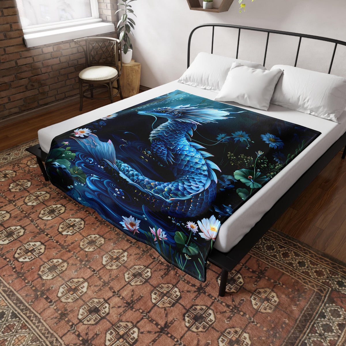 a bed with a blue dragon on it