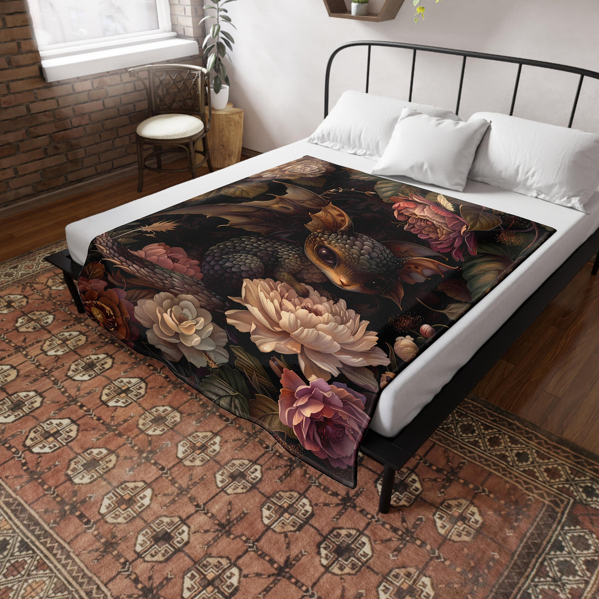 a bed with a floral comforter on top of it