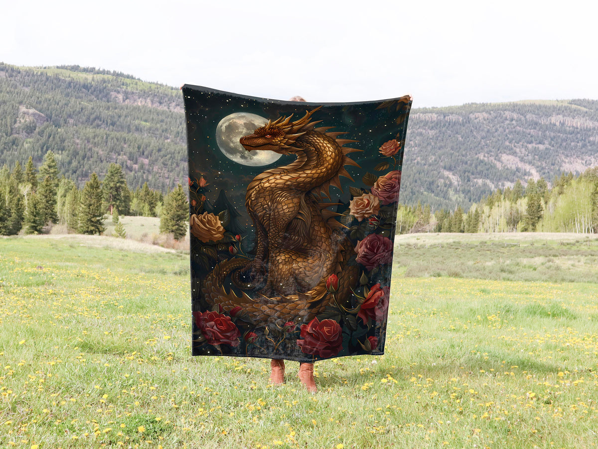 a woman standing in a field holding a large tapestry