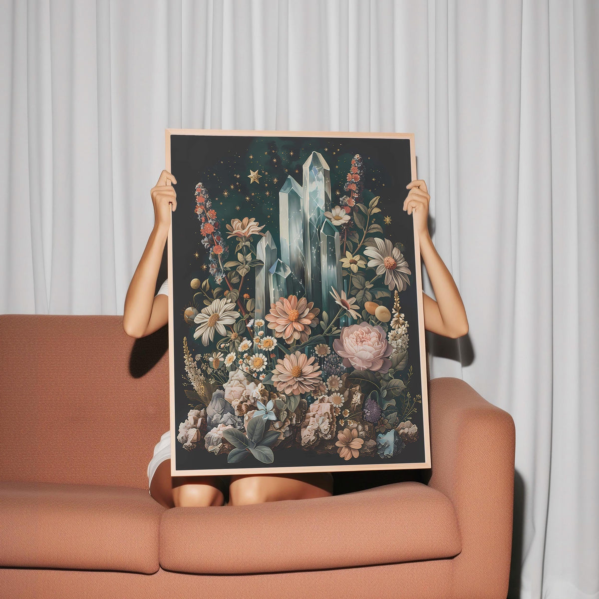 a woman holding up a picture of a crystal tower