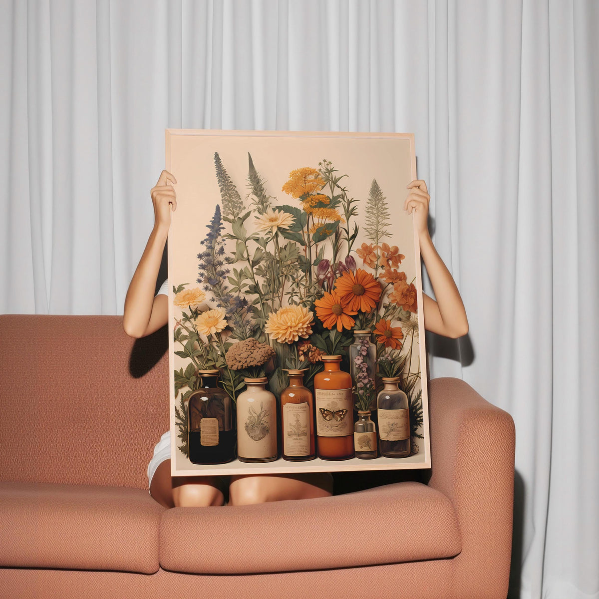 a woman holding up a picture of flowers and jars