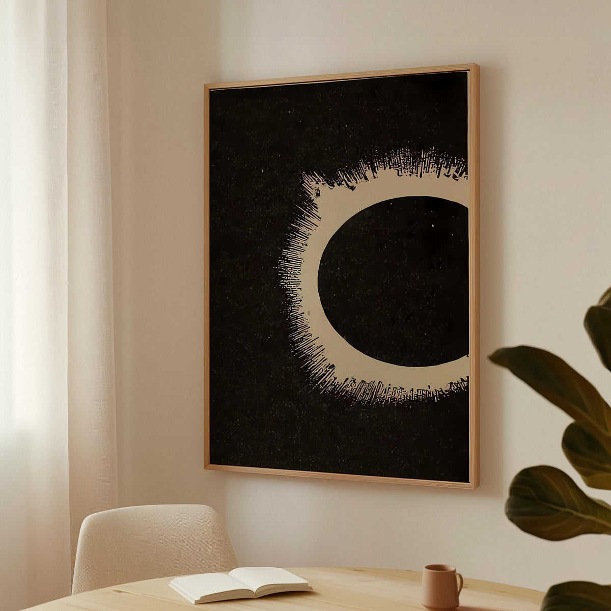 a picture of a black and white circle hanging on a wall