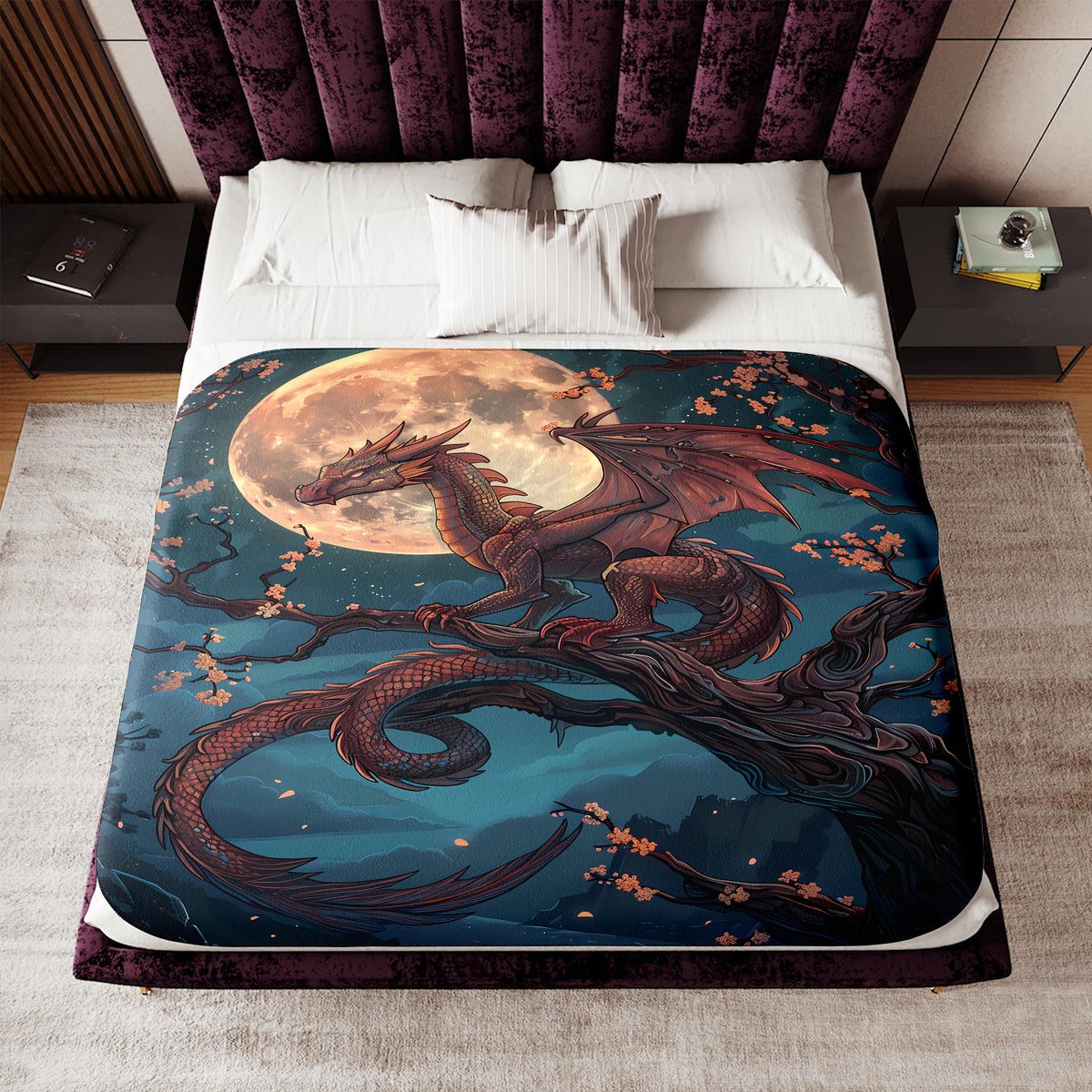 a bed with a dragon on it with a full moon in the background