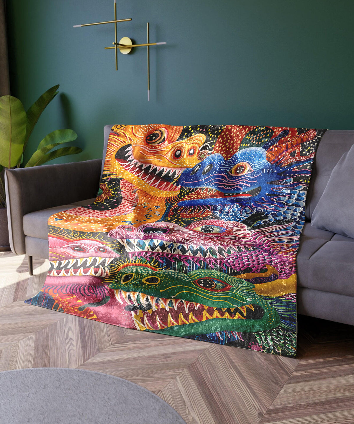 a couch with a colorful blanket on top of it