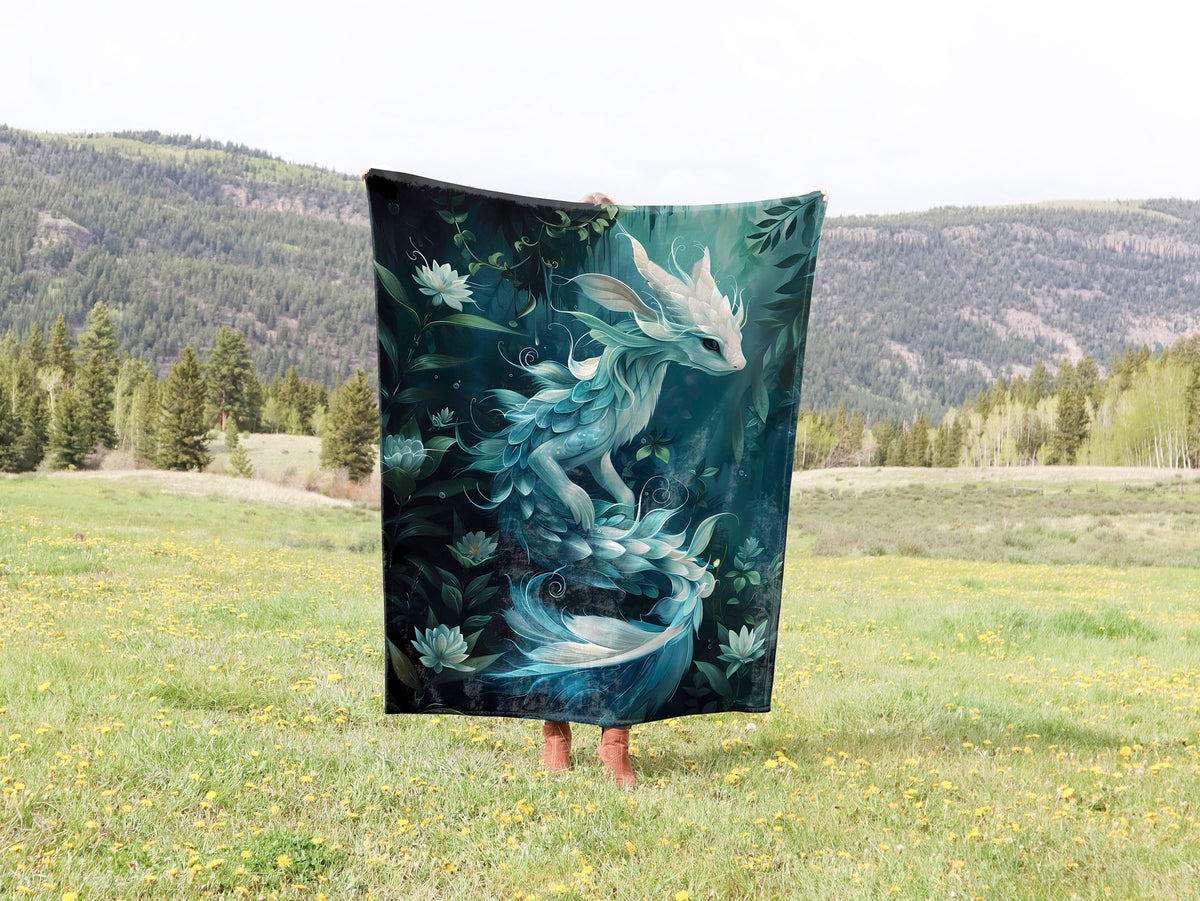 a blanket with a picture of a dragon on it