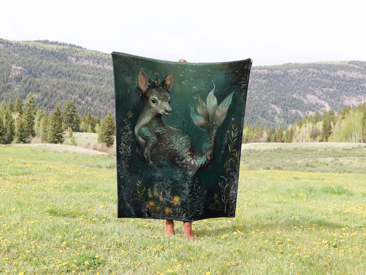 a blanket with a picture of a wolf on it