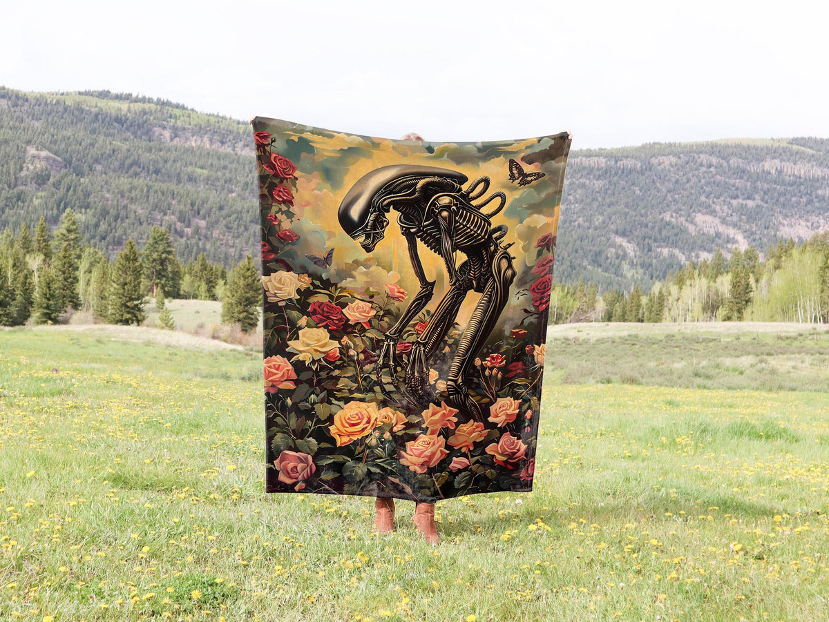 a blanket with a picture of a skeleton riding a horse